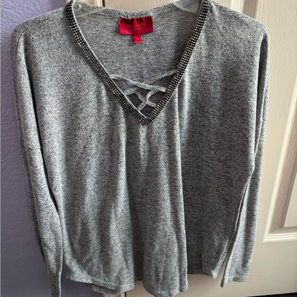 Jennifer Lopez sweater in mint condition